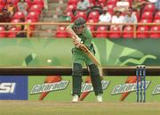 3 April 2007; Eoin Morgan, Ireland, batts off a delivery from South Africa's Shaun Pollock. ICC Cricket World Cup 2007, Super 8, Ireland v South Africa, Guyana National Cricket Stadium, Georgetown, Guyana. Picture credit: Pat Murphy / SPORTSFILE