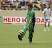 3 April 2007; Ireland's Eoin Morgan in action during a game of gaelic football while they wait for play to resume. ICC Cricket World Cup 2007, Super 8, Ireland v South Africa, Guyana National Cricket Stadium, Georgetown, Guyana. Picture credit: Pat Murphy / SPORTSFILE