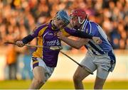 11 October 2014; Oisin O'Rorke, Kilmacud Crokes, in action against David Curtin, Ballyboden St Enda’s. Dublin County Senior Hurling Championship, Semi-Final, Kilmacud Crokes v Ballyboden St Enda’s, Parnell Park, Donnycarney, Dublin. Picture credit: Ray McManus / SPORTSFILE