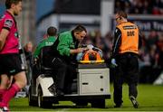 11 October 2014; Mark Bennett, Glasgow Warriors being taken from the pitch by the medical team. Guinness PRO12, Round 6, Ulster v Glasgow Warriors. Kingspan Stadium, Ravenhill Park, Belfast, Co. Antrim. Picture credit: Oliver McVeigh / SPORTSFILE