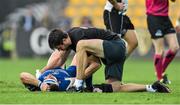 11 October 2014; Marty Moore, Leinster, is treated for an injury by Karl Denvir, Senior Physiotherapist, Leinster. Guinness PRO12, Round 6, Zebre v Leinster. Stadio XXV Aprile, Parma, Italy. Picture credit: Ramsey Cardy / SPORTSFILE