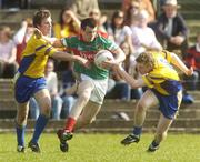 7 April 2007; Aidan Campbell, Mayo, in action against Sean Higgins, left, and Peter Domican, Roscommon. Cadbury's U21 Connacht Football Championship Final, Mayo v Roscommon, McHale Park, Castlebar, Co. Mayo. Picture credit: Pat Murphy / SPORTSFILE
