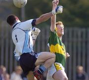 8 April 2007; Colm Cooper, Kerry, punches the ball past Dublin goalkeeper Stephen Cluxton to score his side's first goal. Allianz National Football League, Division 1A, Round 7, Dublin v Kerry, Parnell Park, Dublin. Picture credit: Brendan Moran / SPORTSFILE