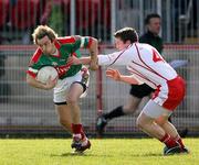 8 April 2007; Conor Mortimer, Mayo, in action against  Dermot Carlin, Tyrone. Allianz National Football League, Division 1A, Round 7, Tyrone v Mayo, Healy Park, Omagh, Co. Tyrone. Picture credit: Oliver McVeigh / SPORTSFILE
