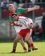 8 April 2007; Davy Harte, Tyrone, in action against Ger Brady, Mayo. Allianz National Football League, Division 1A, Round 7, Tyrone v Mayo, Healy Park, Omagh, Co. Tyrone. Picture credit: Oliver McVeigh / SPORTSFILE