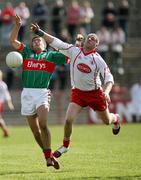 8 April 2007; Pat Harte, Mayo, in action against Kevin Hughes, Tyrone. Allianz National Football League, Division 1A, Round 7, Tyrone v Mayo, Healy Park, Omagh, Co. Tyrone. Picture credit: Oliver McVeigh / SPORTSFILE