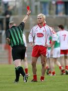 8 April 2007; Tyrone's Owen Mulligan receives a red card from Referee Frank Flynn. Allianz National Football League, Division 1A, Round 7, Tyrone v Mayo, Healy Park, Omagh, Co. Tyrone. Picture credit: Oliver McVeigh / SPORTSFILE