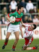 8 April 2007; Aidan Higgans, Mayo, in action against Colm Cavanagh, Tyrone. Allianz National Football League, Division 1A, Round 7, Tyrone v Mayo, Healy Park, Omagh, Co. Tyrone. Picture credit: Oliver McVeigh / SPORTSFILE