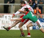 8 April 2007; Stephen O'Neill, Tyrone, in action against Keith Higgans, Mayo. Allianz National Football League, Division 1A, Round 7, Tyrone v Mayo, Healy Park, Omagh, Co. Tyrone. Picture credit: Oliver McVeigh / SPORTSFILE