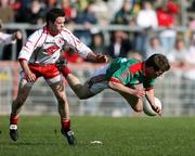 8 April 2007; Trevor Howley, Mayo, in action against Martin Penrose, Tyrone. Allianz National Football League, Division 1A, Round 7, Tyrone v Mayo, Healy Park, Omagh, Co. Tyrone. Picture credit: Oliver McVeigh / SPORTSFILE