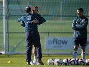 12 October 2014; Republic of Ireland's Richard Keogh embraces manager Martin O'Neill, as assistant manager Roy Keane looks on, before leaving the squad due to injury, at squad training ahead of their UEFA EURO 2016 Championship Qualifer, Group D, game against Germany on Tuesday. Republic of Ireland Squad Training, Gannon Park, Malahide, Co. Dublin. Picture credit: David Maher / SPORTSFILE