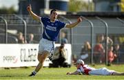 12 October 2014; Conor McGrath, Cratloe, celebrates after scoring his side's first goal past Eire Og goalkeeper Colin Smyth. Clare County Senior Football Championship Final, Cratloe v Eire Og. Cusack Park, Ennis, Co. Clare. Picture credit: Diarmuid Greene / SPORTSFILE