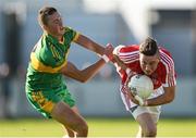 12 October 2014; David Hanlon, Edenderry, in action against Darren Garry, Rhode. Offaly County Senior Football Championship Final, Edenderry v Rhode, O'Connor Park, Tullamore, Co. Offaly. Photo by Sportsfile