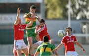 12 October 2014; Conor McNamee, Rhode, in action against Basil Malone, left, and Derek Kelly, Edenderry. Offaly County Senior Football Championship Final, Edenderry v Rhode, O'Connor Park, Tullamore, Co. Offaly. Photo by Sportsfile