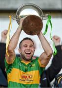12 October 2014; Rhode captain Pauric Sullivan lifts the Dowling Cup. Offaly County Senior Football Championship Final, Edenderry v Rhode, O'Connor Park, Tullamore, Co. Offaly. Photo by Sportsfile