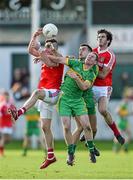 12 October 2014; David Halon, left, and Richie Dalton, Edenderry, in action against Ciaran Heavy and Glenn O'Connell, Rhode. Offaly County Senior Football Championship Final, Edenderry v Rhode, O'Connor Park, Tullamore, Co. Offaly. Photo by Sportsfile