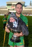 12 October 2014; Edenderry captain Richie Dalton with 5 month old Ruarí Claffey in the Dowling Cup. Offaly County Senior Football Championship Final, Edenderry v Rhode, O'Connor Park, Tullamore, Co. Offaly. Photo by Sportsfile