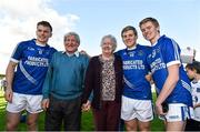 12 October 2014; Cratloe players, and brothers, from left to right, Sean Collins, Padraic Collins, and David Collins celebrate with their grandparents Annette and Cyril Collins after victory over Eire Og. Clare County Senior Football Championship Final, Cratloe v Eire Og. Cusack Park, Ennis, Co. Clare. Picture credit: Diarmuid Greene / SPORTSFILE