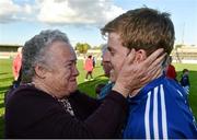 12 October 2014; Cratloe's Padraic Collins is congratulated by his grandmother Annette Collins after victory over Eire Og. Clare County Senior Football Championship Final, Cratloe v Eire Og. Cusack Park, Ennis, Co. Clare. Picture credit: Diarmuid Greene / SPORTSFILE