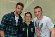 12 October 2014; Katie Taylor with Munster Rugby's Conor Murray, left, and Andrew Conway. International Boxing, Katie Taylor v Oshin Derieuw, University of Limerick, Limerick. Picture credit: Diarmuid Greene / SPORTSFILE
