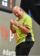 12 October 2014; Michael van Gerwen celebrates score 180 in the third leg of the eight set during his match with James Wade. partypoker.com World Grand Prix Final, Citywest Hotel, Saggart, Co. Dublin. Picture credit: Barry Cregg / SPORTSFILE