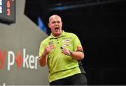12 October 2014; Michael van Gerwen celebrates after throwing the winning dart to become the World Gran Prix Champion. partypoker.com World Grand Prix Final, Citywest Hotel, Saggart, Co. Dublin. Picture credit: Barry Cregg / SPORTSFILE