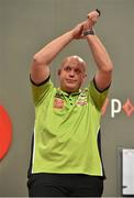 12 October 2014; Michael van Gerwen salutes the crowd after winning his match, and the Grand Prix, against James Wade. partypoker.com World Grand Prix Final, Citywest Hotel, Saggart, Co. Dublin. Picture credit: Barry Cregg / SPORTSFILE