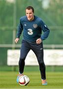 13 October 2014; Republic of Ireland's John O'Shea in action during squad training ahead of their UEFA EURO 2016 Championship Qualifer, Group D, game against Germany on Tuesday. Republic of Ireland Squad Training, Gannon Park, Malahide, Co. Dublin. Picture credit: Brendan Moran / SPORTSFILE