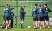 13 October 2014; Republic of Ireland assistant manager Roy Keane speaks to the players during squad training ahead of their UEFA EURO 2016 Championship Qualifer, Group D, game against Germany on Tuesday. Republic of Ireland Squad Training, Gannon Park, Malahide, Co. Dublin. Picture credit: Brendan Moran / SPORTSFILE