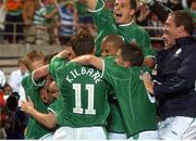5 June 2002; Robbie Keane, Republic of Ireland, is congratulated by team-mates after his goal against Germany. FIFA World Cup Finals, Group E, Republic of Ireland v Germany, Ibaraki Stadium, Ibaraki, Japan. Picture credit: David Maher / SPORTSFILE