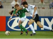 5 June 2002; Damien Duff, Republic of Ireland, is tackled by Christophe Metzelder, Germany. FIFA World Cup Finals, Group E, Republic of Ireland v Germany, Ibaraki Stadium, Ibaraki, Japan. Picture credit: David Maher / SPORTSFILE