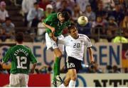 5 June 2002; Gary Breen, Republic of Ireland, heads clear of Oliver Bierhoff, Germany. FIFA World Cup Finals, Group E, Republic of Ireland v Germany, Ibaraki Stadium, Ibaraki, Japan. Picture credit: David Maher / SPORTSFILE
