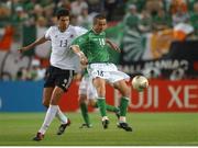 5 June 2002; Gary Kelly, Republic of Ireland, is tackled by Michael Ballack, Germany. FIFA World Cup Finals, Group E, Republic of Ireland v Germany, Ibaraki Stadium, Ibaraki, Japan. Picture credit: David Maher / SPORTSFILE