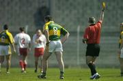 31 March 2007; Darragh O Se, Kerry, is shown a yellow card by referee Pat McGovern. Allianz National Football League, Division 1A Round 6, Kerry v Tyrone, Austin Stack Park, Tralee, Co. Kerry. Picture credit: Brendan Moran / SPORTSFILE
