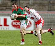 8 April 2007; Keith Higgins, Mayo, in action against Stephen O'Neill, Tyrone. Allianz National Football League, Division 1A, Round 7, Tyrone v Mayo, Healy Park, Omagh, Co. Tyrone. Picture credit: Oliver McVeigh / SPORTSFILE