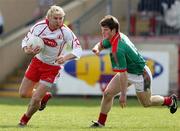 8 April 2007; Owen Mulligan, Tyrone, in action against Trevor Howley, Mayo. Allianz National Football League, Division 1A, Round 7, Tyrone v Mayo, Healy Park, Omagh, Co. Tyrone. Picture credit: Oliver McVeigh / SPORTSFILE