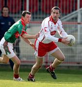 8 April 2007; Stephen O'Neill, Tyrone, in action against Trevor Howley, Mayo. Allianz National Football League, Division 1A, Round 7, Tyrone v Mayo, Healy Park, Omagh, Co. Tyrone. Picture credit: Oliver McVeigh / SPORTSFILE