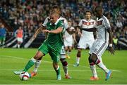 14 October 2014; Jonathan Walters, Republic of Ireland, in action against Jerome Boateng and Antonio Rudiger, Germany. UEFA EURO 2016 Championship Qualifer, Group D, Germany v Republic of Ireland, Veltins Stadium, Gelsenkirchen, Germany. Picture credit: David Maher / SPORTSFILE