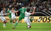 14 October 2014; Republic of Ireland's John O'Shea shoots to score his side's equalising goal despite the attempts of Germany's Mats Hummels. UEFA EURO 2016 Championship Qualifer, Group D, Germany v Republic of Ireland, Veltins Stadium, Gelsenkirchen, Germany. Picture credit: Pat Murphy / SPORTSFILE