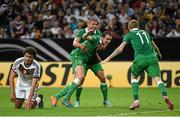 14 October 2014; Republic of Ireland's John O'Shea, centre, celebrates with team-mates Jonathan Walters and James McClean, right, after scoring his side's equalising goal. UEFA EURO 2016 Championship Qualifer, Group D, Germany v Republic of Ireland, Veltins Stadium, Gelsenkirchen, Germany. Picture credit: Pat Murphy / SPORTSFILE