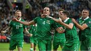 14 October 2014; Republic of Ireland's John O'Shea, 4, celebrates after scoring his side's equalising goal with team-mates, from left, James McClean, Stephen Ward and Jonathan Walters. UEFA EURO 2016 Championship Qualifer, Group D, Germany v Republic of Ireland, Veltins Stadium, Gelsenkirchen, Germany. Picture credit: David Maher / SPORTSFILE