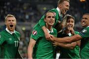 14 October 2014; Republic of Ireland's John O'Shea, 4, celebrates after scoring his side's equalising goal with team-mates, from left, James McClean, Aiden McGeady  Stephen Ward and Jonathan Walters. UEFA EURO 2016 Championship Qualifer, Group D, Germany v Republic of Ireland, Veltins Stadium, Gelsenkirchen, Germany. Picture credit: David Maher / SPORTSFILE