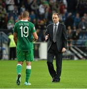 14 October 2014; Republic of Ireland manager Martin O'Neill with Jonathan Walters after the game. UEFA EURO 2016 Championship Qualifer, Group D, Germany v Republic of Ireland, Veltins Stadium, Gelsenkirchen, Germany. Picture credit: David Maher / SPORTSFILE