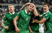 14 October 2014; John O'Shea, Republic of Ireland, celebrates after scoring his side's equalizing goal with team-mates, from left, James McClean, Jeff Henderick and Stephen Ward. UEFA EURO 2016 Championship Qualifer, Group D, Germany v Republic of Ireland, Veltins Stadium, Gelsenkirchen, Germany. Picture credit: David Maher / SPORTSFILE