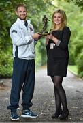 16 October 2014; Dane Massey, Dundalk, is presented with the SSE Airtricity / SWAI Player of the Month Award for September 2014 by Leanne Shiel, SSE Airtricity. The Davenport Hotel, Dublin. Picture credit: Matt Browne / SPORTSFILE