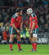 10 October 2014; Munster's Eusebio Guinazu, left, and Duncan Williams in conversation during a break in play. Guinness PRO12, Round 6, Munster v Scarlets. Thomond Park, Limerick. Picture credit: Diarmuid Greene / SPORTSFILE