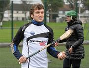 17 October 2014; Clare Hurler Shane O Donnell showcasing his hurling skills to delegates from the One Young World Summit at Na Fianna GAA club, Glasnevin, Dublin. Picture credit: David Maher / SPORTSFILE