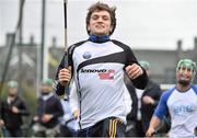 17 October 2014; Clare Hurler Shane O Donnell showcasing his hurling skills to delegates from the One Young World Summit at Na Fianna GAA club, Glasnevin, Dublin. Picture credit: David Maher / SPORTSFILE