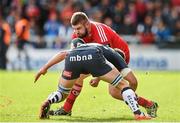 18 October 2014; Duncan Casey, Munster, is tackled by Mark Easter, Sale Sharks. European Rugby Champions Cup 2014/15, Pool 1, Round 1, Sale Sharks v Munster, AJ Bell Stadium, Sale, Greater Manchester, England. Picture credit: Brendan Moran / SPORTSFILE