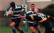 27 November 1999; Blair Davis of Suttonians RFC is tackled by Joff Dodds of Banbridge RFC during the AIB All-Ireland League Division 4 match between Suttonians RFC and Banbridge RFC at the McDowell Grounds in Sutton, Dublin. Photo by Matt Browne/Sportsfile